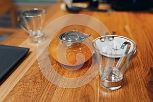 Sea buckthorn tea in a teapot on the table