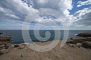 The sea in Calafat on the darted coast of Tarragona photo