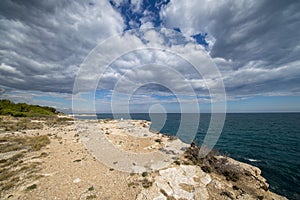 The sea in Calafat on the darted coast of Tarragona photo