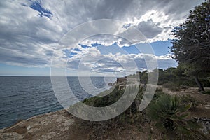 The sea in Calafat on the darted coast of Tarragona photo