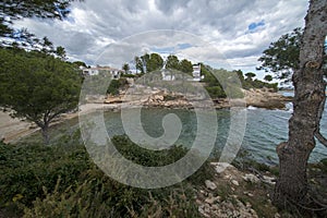 The sea in Calafat on the darted coast of Tarragona photo