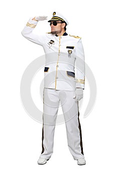 Sea captain in a white suit and sunglasses