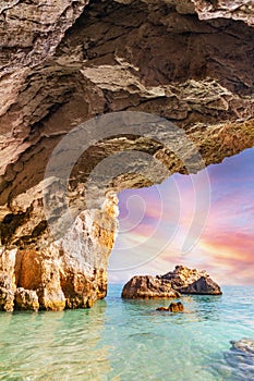 Sea cave in Zakynthos, Greece at sunset. Xigia beach