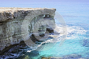 Sea caves in the high cliffs