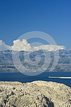 Sea channel in Croatia under mountain