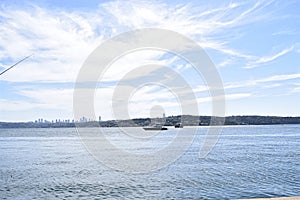 Sea and city views with white clouds photo