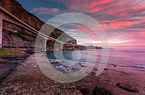 Sea Cliff Bridge and sunrise ocean