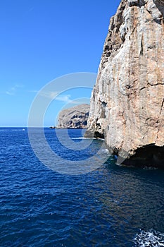 Sea cliffs and island, Sardinia