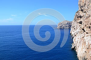 Sea cliffs and island, Sardinia