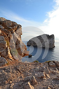 Sea cliffs and island, Sardinia