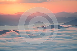 Sea of clouds in mountain at sunrise. Carpathians, the ridge Borzhava, Ukraine.