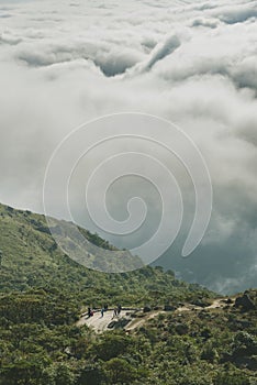 Sea of clouds and uphill country road in Hong Kong