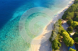 Sea coast as a background from top view. Turquoise water background from top view. Summer seascape from air. Bali island, Indonesi