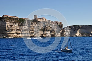 A sea coast in Corsica, Corse, France Europe with cliffs and small town