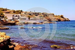 Sea coast and turqiouse water of habour, Crete, Greece