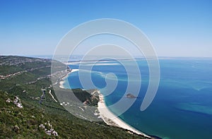 Sea coastal landscape with sandy Portinho beach photo