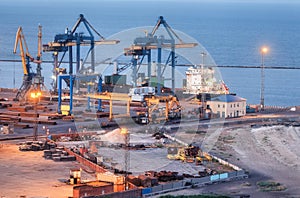 Sea commercial port at night in Mariupol, Ukraine before the war photo