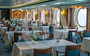 Sea cruises. interior of restaurant on sea liner. meals on cruises. internal public areas on board cruise ship