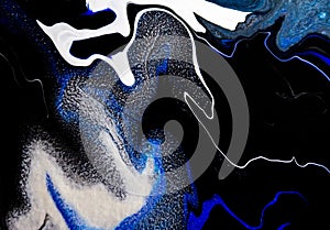 Sea deep inspired abstract marble liquid texture in silver white glitter, indigo, ultramarine and black colors.