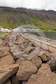 Sea defence wall in ÃsafjÃ¶rÃ°ur Iceland