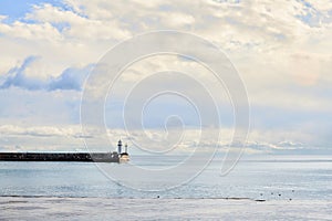 Sea embankment and lighthouse in the city of Yalta. Black Sea.