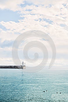 Sea embankment and lighthouse in the city of Yalta. Black Sea.