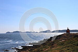 Sea, fields and lighthouse