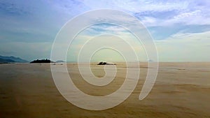 Sea Filled with Clayey Rocks under Pictorial Sky Upper View