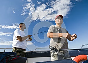 Sea fishermen looking ahead photo