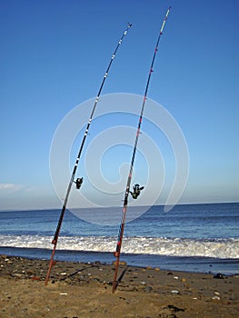 Sea fishing rods on beach