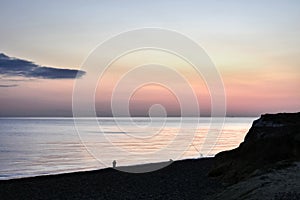 Sea Fishing from a shingle beach at Dawn