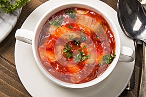 Sea food mix soup in a white bowl