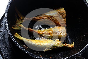 sea fried fish with spice and oil