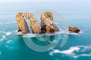 Sea Gate or Canto del Diablo at Broken coast, Cantabria Spain photo