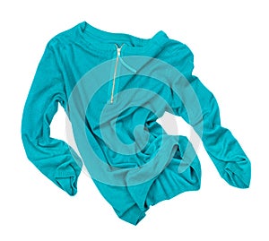 Sea-green pullover in motion in the air