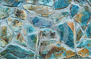 Sea-green stone wall