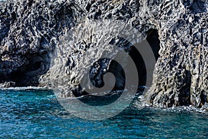 Sea grotto of frozen volcanic lava