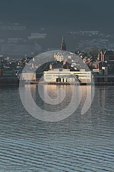 Sea gulf and city ashore early in morning. Bergen, Norway