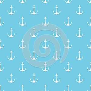 White anchor on a blue background. photo