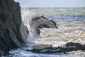 Sea Hitting Rocks