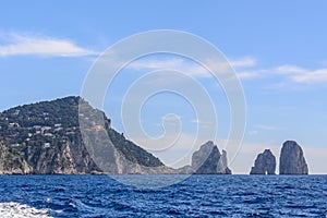 Sea and impressive rocks on Capri Island. A very picturesque, lu