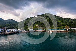 Sea and island with the rain cloud background