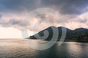 Sea and island with the rain cloud background