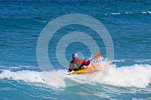 Sea Kayak turning on a wave