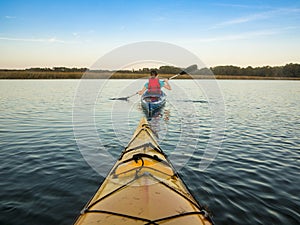 Sea kayaking at sunset