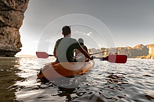 Sea kayaking at tropical bay