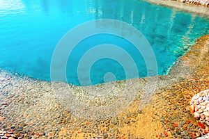 Sea lagoon with clear blue water.