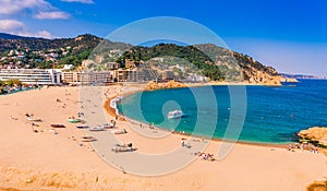 Sea landscape Badia bay in Tossa de Mar in Girona, Catalonia, Spain near of Barcelona. Ancient medieval castle with nice sand