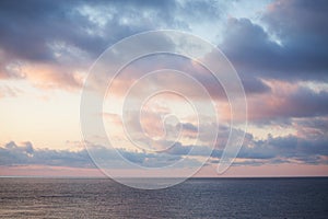 Sea landscape with a cloudy sky in