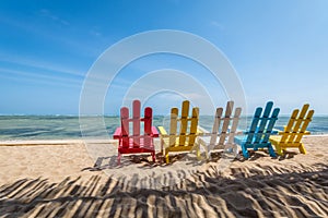 Sea landscape place to meditate on the beach with colorful chairs